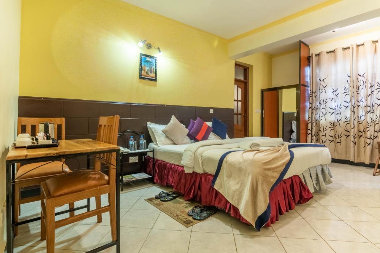 Crest Safari Lodge Bed And Breakfast Arusha Esterno foto